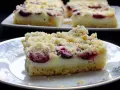 Pyszne ciasto z czereśniami i budyniem, posypane kruszonką. Idealne na deser.